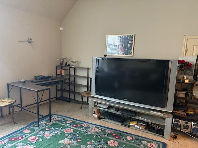 carpeted living room featuring lofted ceiling