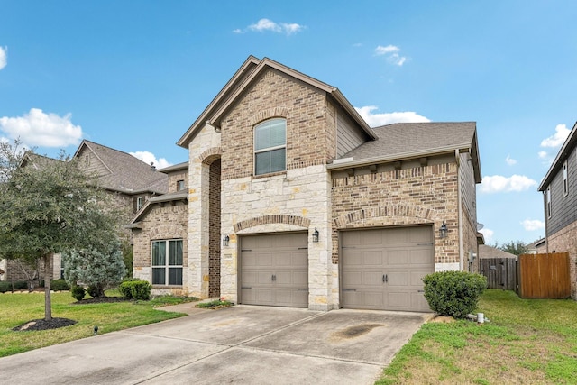 front facade with a garage and a front yard