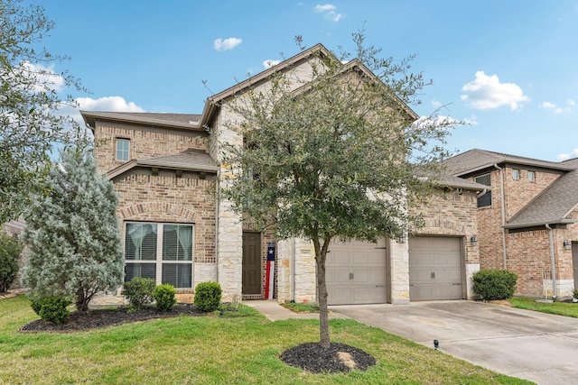 view of front of house featuring a garage and a front yard