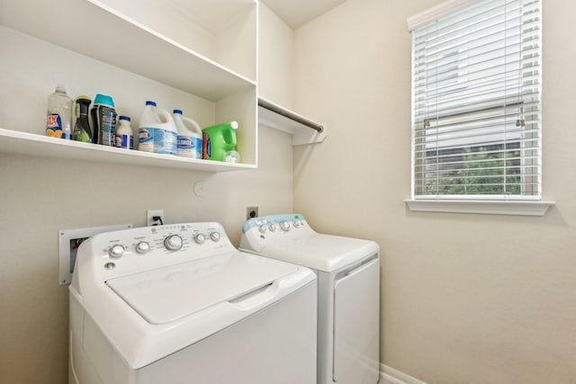 laundry room with washer and clothes dryer