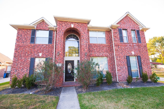 view of front of home with a front lawn