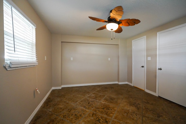 spare room featuring ceiling fan