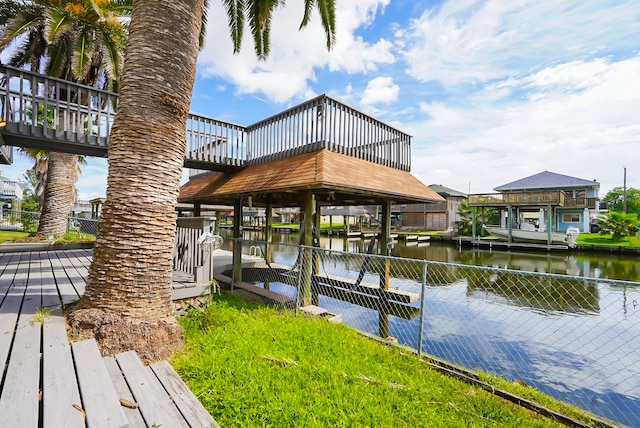 dock area with a water view