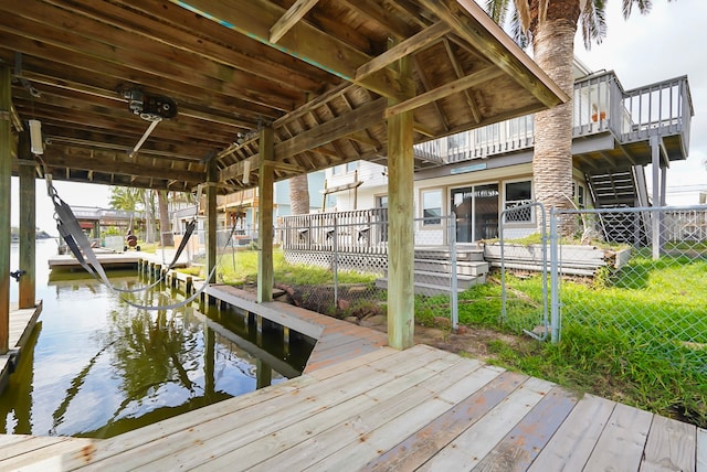 dock area with a water view