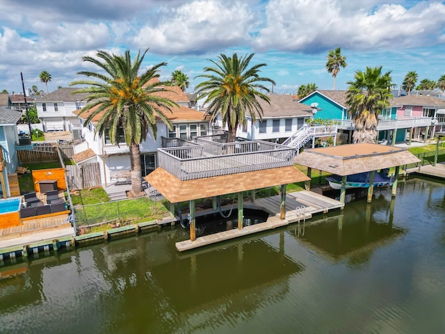 view of dock featuring a deck with water view