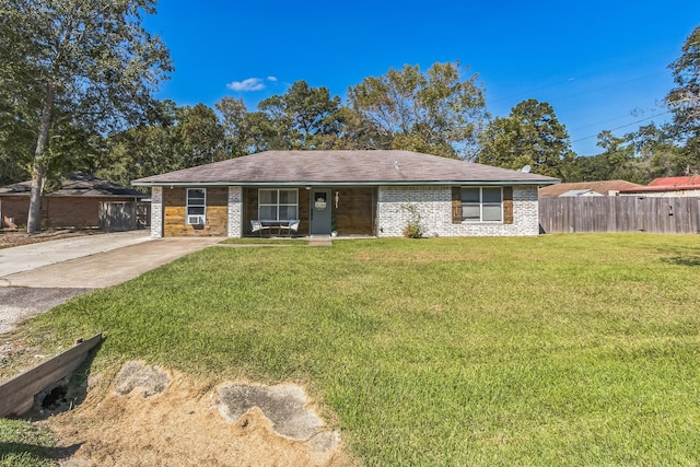 ranch-style home with a front lawn