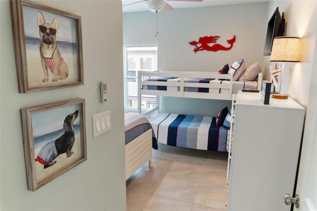 bedroom featuring light tile patterned flooring