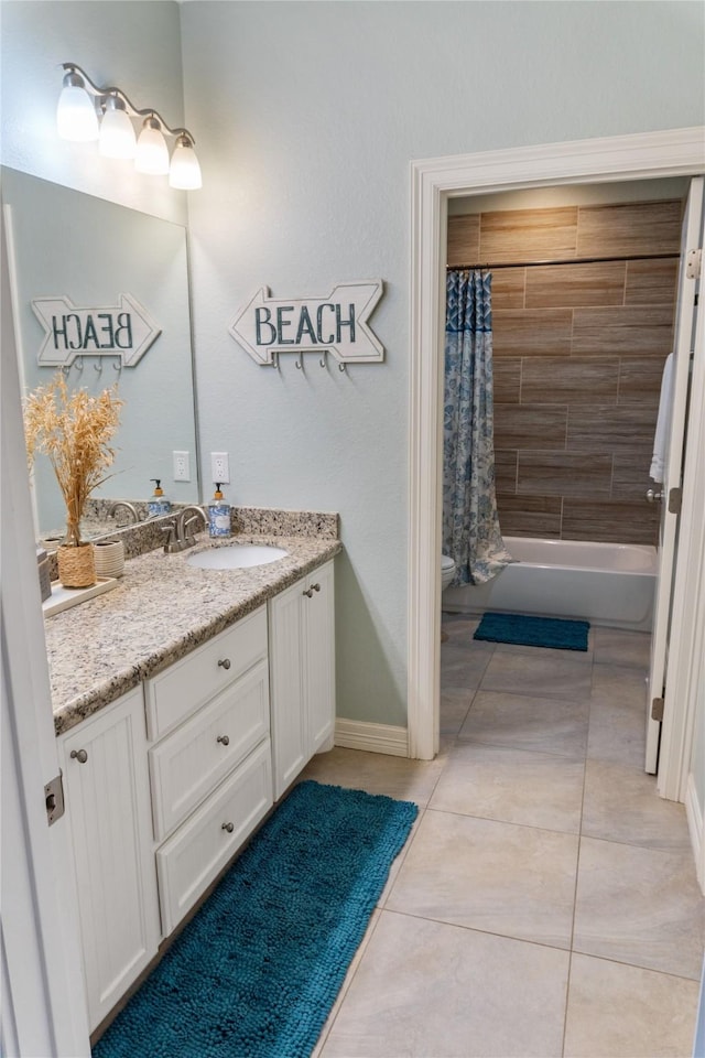 bathroom featuring tile patterned floors, toilet, shower / tub combo, baseboards, and vanity