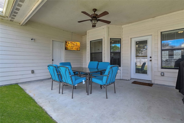 view of patio / terrace featuring ceiling fan