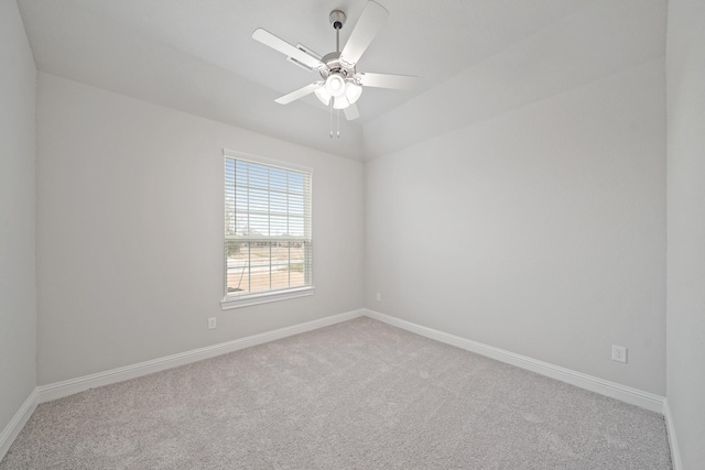 empty room featuring ceiling fan and carpet floors