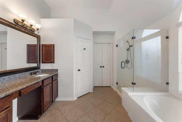 bathroom with vanity, separate shower and tub, and tile patterned flooring