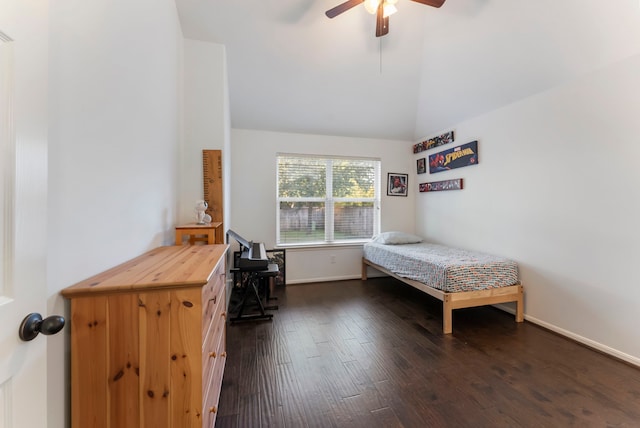 bedroom featuring dark hardwood / wood-style floors, high vaulted ceiling, and ceiling fan