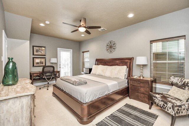 carpeted bedroom with ceiling fan