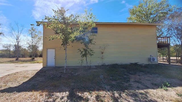 view of home's exterior with a deck