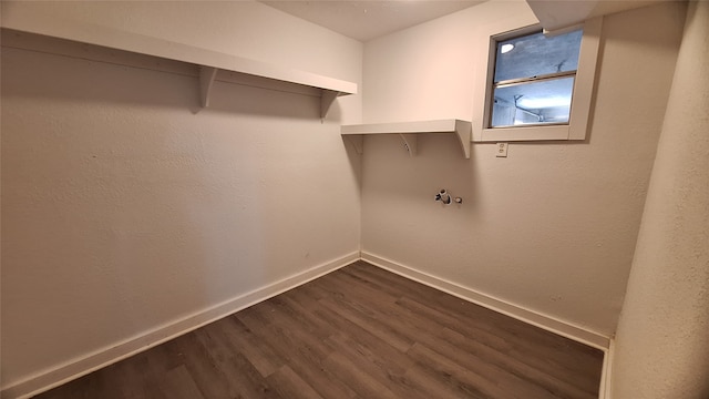 1284 Beaver Lake Dr, Caldwell, TX 77836 - washroom featuring dark wood finished floors and baseboards