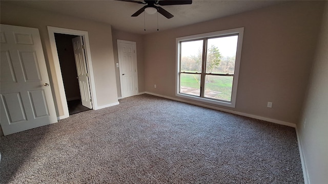 1284 Beaver Lake Dr, Caldwell, TX 77836 - unfurnished bedroom with ceiling fan, carpet floors, and baseboards