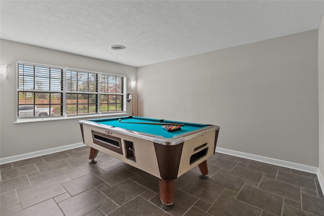 playroom with billiards and a textured ceiling