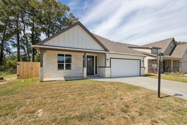 view of front facade featuring a shingled roof, stone siding, a garage, board and batten siding, and driveway
