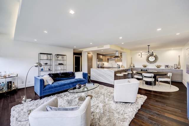 living area featuring dark wood-style floors, recessed lighting, and baseboards