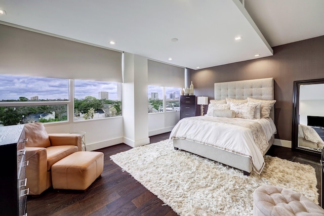 bedroom featuring baseboards, recessed lighting, and dark wood finished floors