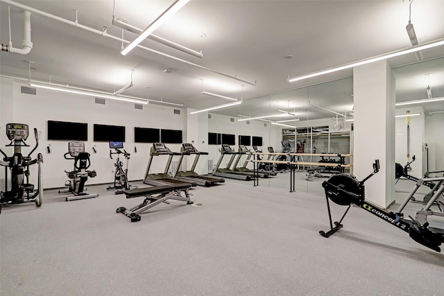 workout area featuring visible vents