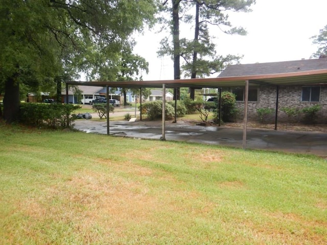 view of yard with a carport