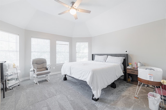 bedroom with ceiling fan, carpet, and vaulted ceiling