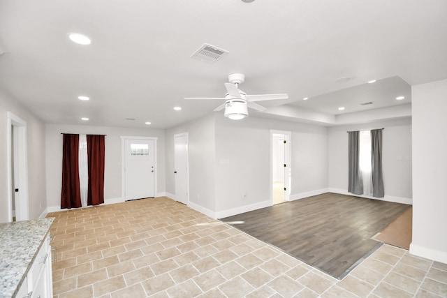 entryway featuring light hardwood / wood-style flooring and ceiling fan