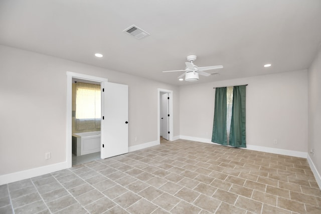 unfurnished room featuring ceiling fan