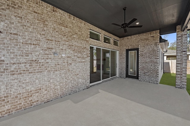 view of patio / terrace featuring ceiling fan