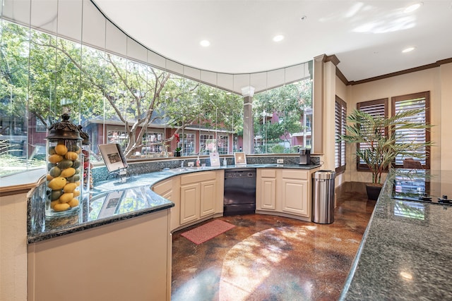 kitchen featuring a wealth of natural light, dishwasher, crown molding, and dark stone countertops