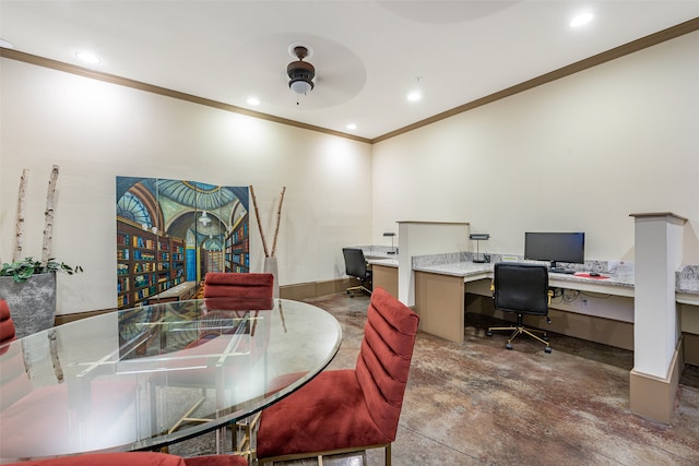 home office with built in desk, ceiling fan, and crown molding