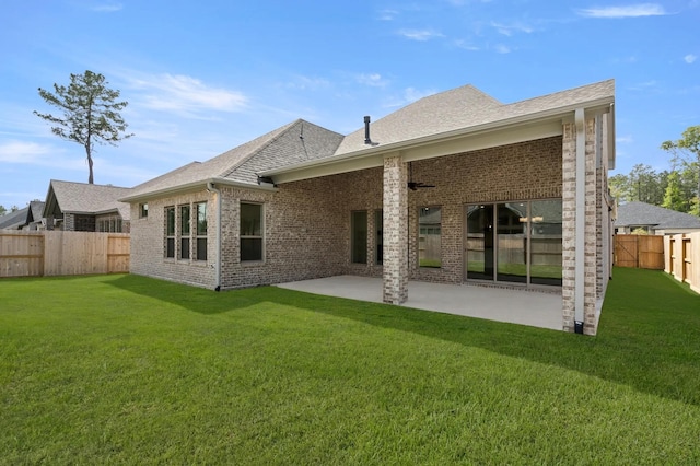 22067 Breakwater Ln, Porter, TX 77365 - rear view of property with a patio area, brick siding, and roof with shingles