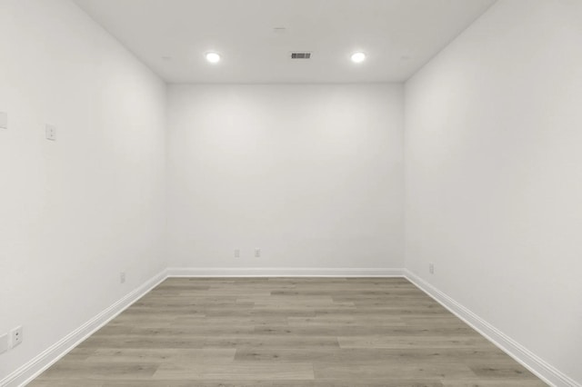 22067 Breakwater Ln, Porter, TX 77365 - empty room featuring light wood-style floors, recessed lighting, and baseboards
