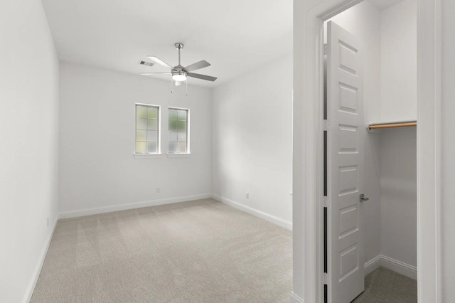 22067 Breakwater Ln, Porter, TX 77365 - unfurnished bedroom featuring a spacious closet, carpet floors, and baseboards