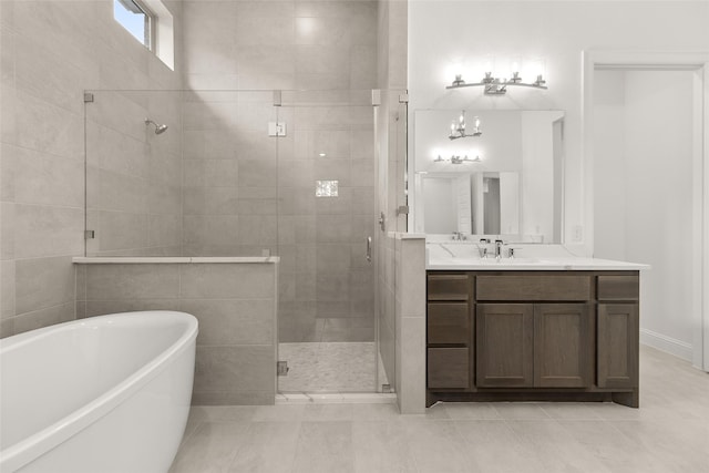 22067 Breakwater Ln, Porter, TX 77365 - bathroom with a soaking tub, a stall shower, vanity, and tile patterned flooring
