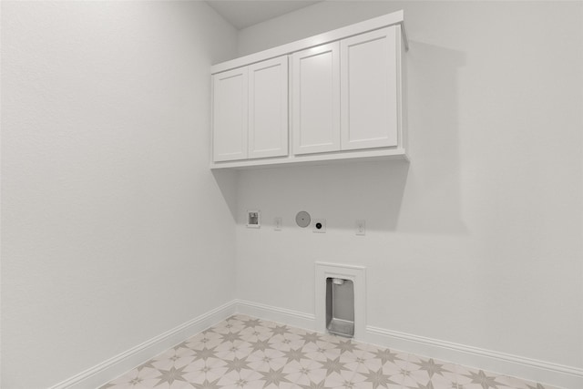 22067 Breakwater Ln, Porter, TX 77365 - washroom featuring cabinet space, hookup for a gas dryer, light floors, electric dryer hookup, and washer hookup