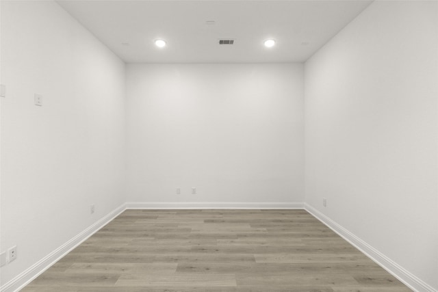 22067 Breakwater Ln, Porter, TX 77365 - unfurnished room with recessed lighting, light wood finished floors, and baseboards