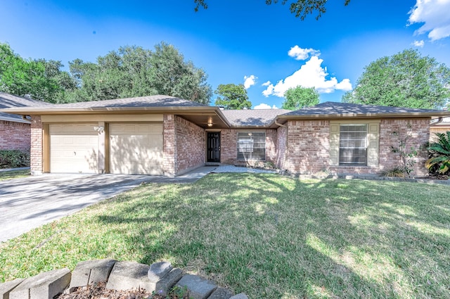 view of front facade with a garage and a front lawn