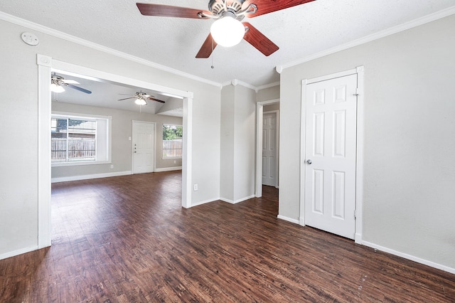 unfurnished room featuring dark wood-type flooring, ceiling fan, crown molding, and a textured ceiling