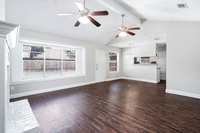 unfurnished living room with vaulted ceiling with beams, a textured ceiling, ceiling fan with notable chandelier, and dark hardwood / wood-style flooring