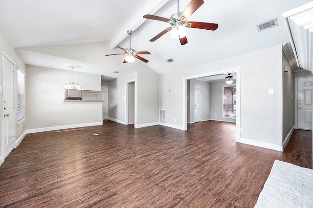 unfurnished living room with dark wood-type flooring, a healthy amount of sunlight, a chandelier, and vaulted ceiling with beams