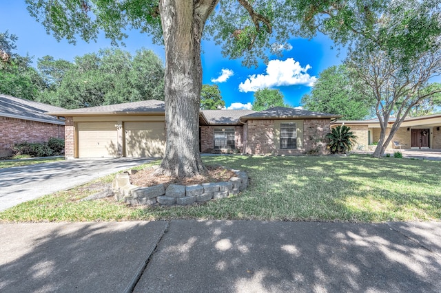 ranch-style house with a front lawn and a garage