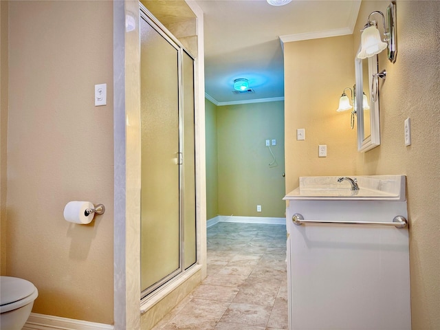 bathroom with vanity, ornamental molding, a stall shower, and toilet