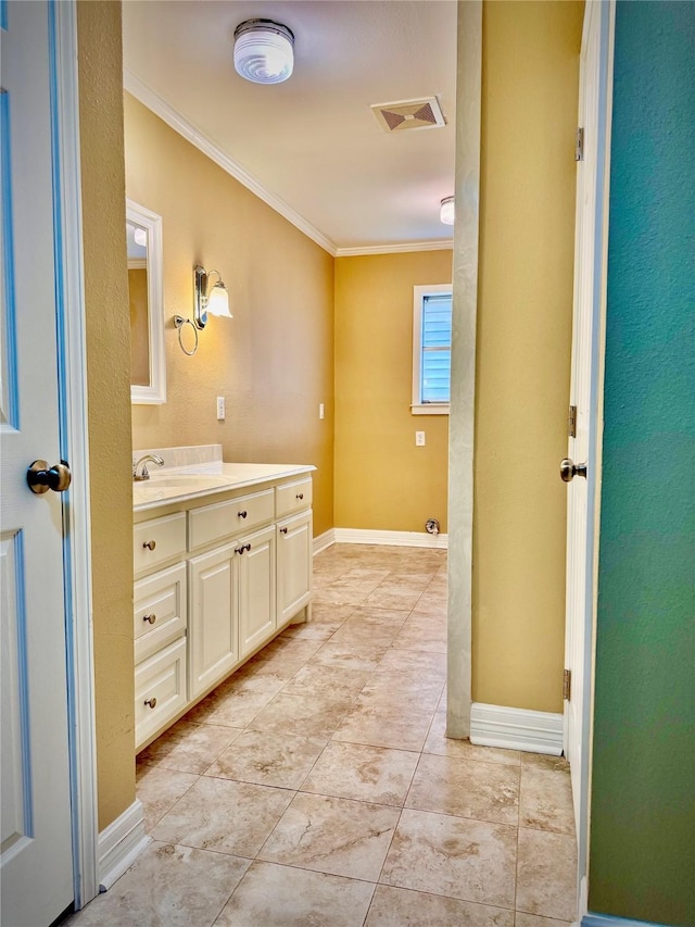 bathroom with visible vents, crown molding, tile patterned flooring, vanity, and baseboards