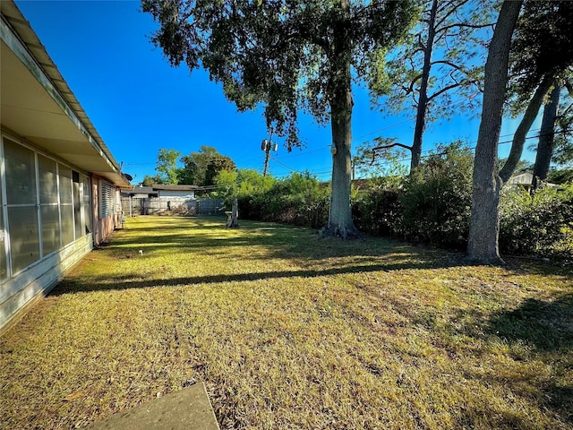 view of yard with fence