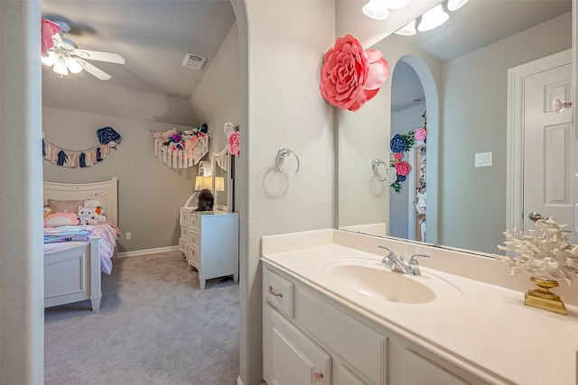 bathroom featuring ceiling fan and vanity