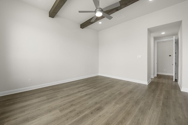 4707 Arbor Park Dr, Manvel, TX 77583 - empty room with beamed ceiling, a ceiling fan, dark wood-style flooring, baseboards, and recessed lighting