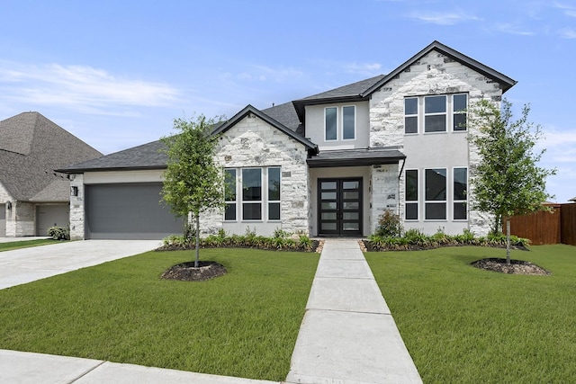 4707 Arbor Park Dr, Manvel, TX 77583 - view of front of house with stone siding, an attached garage, driveway, stucco siding, and roof with shingles