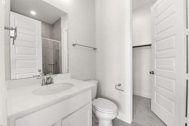4707 Arbor Park Dr, Manvel, TX 77583 - bathroom featuring toilet, tiled shower, vanity, and baseboards